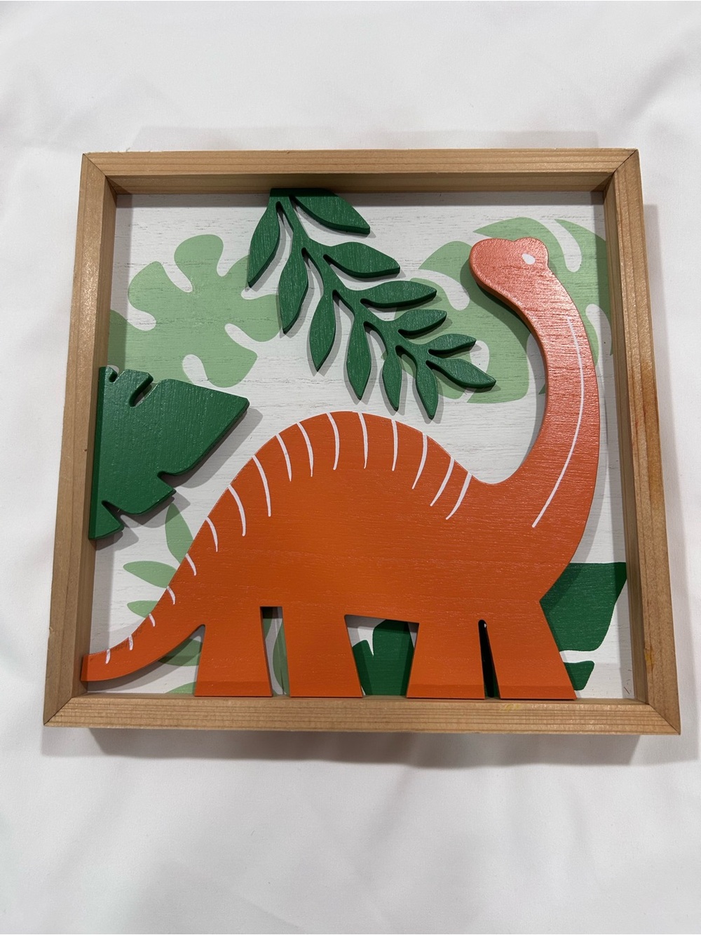 Hobby Lobby Orange Dinosaur Wall Art with Green Leaves
